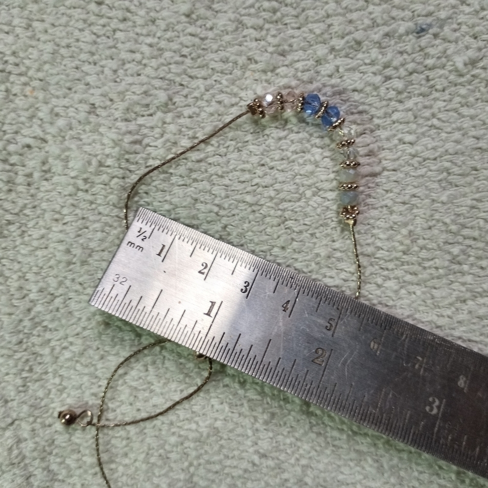Petite goldtone adjustable blue beaded bracelet - Picture 3 of 4
